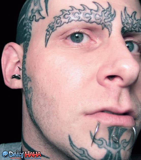 retarded_tattoo_face_guy.jpg