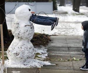 nommm nom nom nom kid eating snowman funny picture