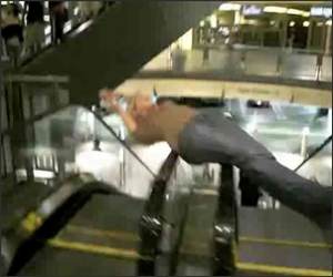 Escalator Spinner Girl