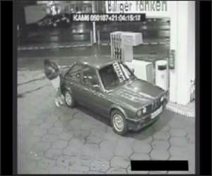 Woman pumping gas